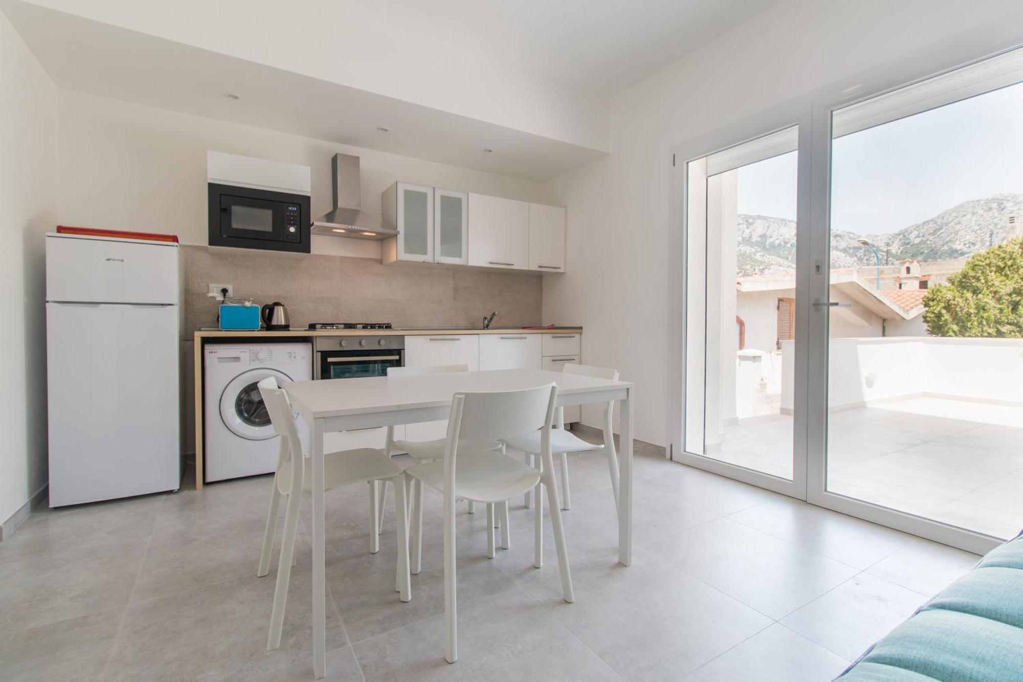 Appartamento Perla Bianca, Con Wifi E Air Con Cala Gonone Bagian luar foto